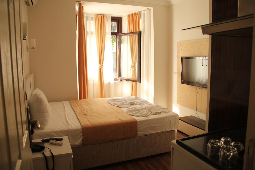 Taksim Square Hot Residence Estambul Habitación foto